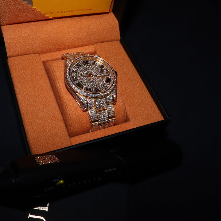 ICECLIQUE Jewelry fully iced VVS1 Moissanite Corore watch with gold band and Roman numeral dial, showcasing luxurious elegance.