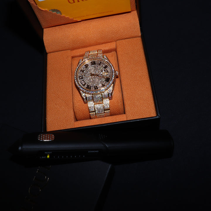 Fully iced VVS1 Corore gold watch with Roman numeral dial featuring sparkling moissanite accents by ICECLIQUE JEWELRY.