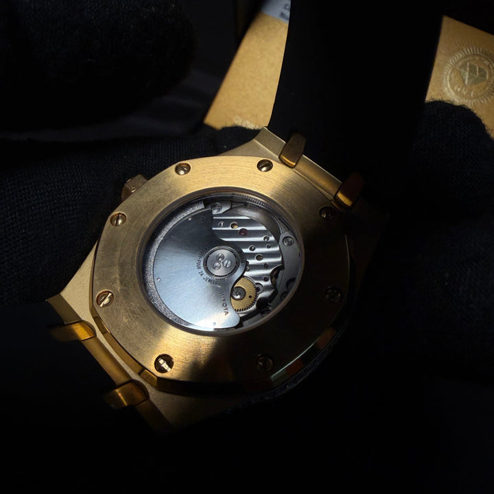 VVS1 Luxor watch with black rubber strap, gold case, and moissanite accents by ICECLIQUE JEWELRY.