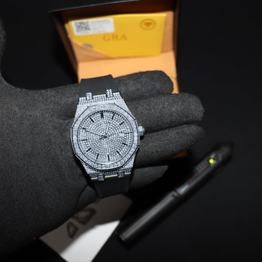 ICECLIQUE Jewelry VVS1 Luxor V2 watch with black rubber strap, white gold case, and moissanite gemstone for elegant style.